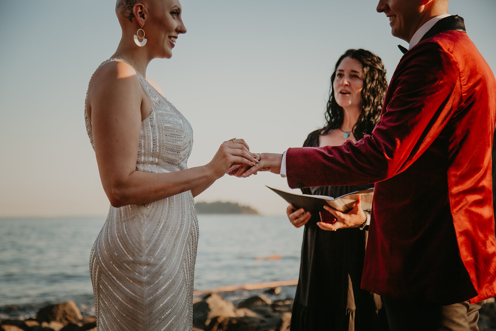 couple exchanging wedding rings in Vancouver elopement