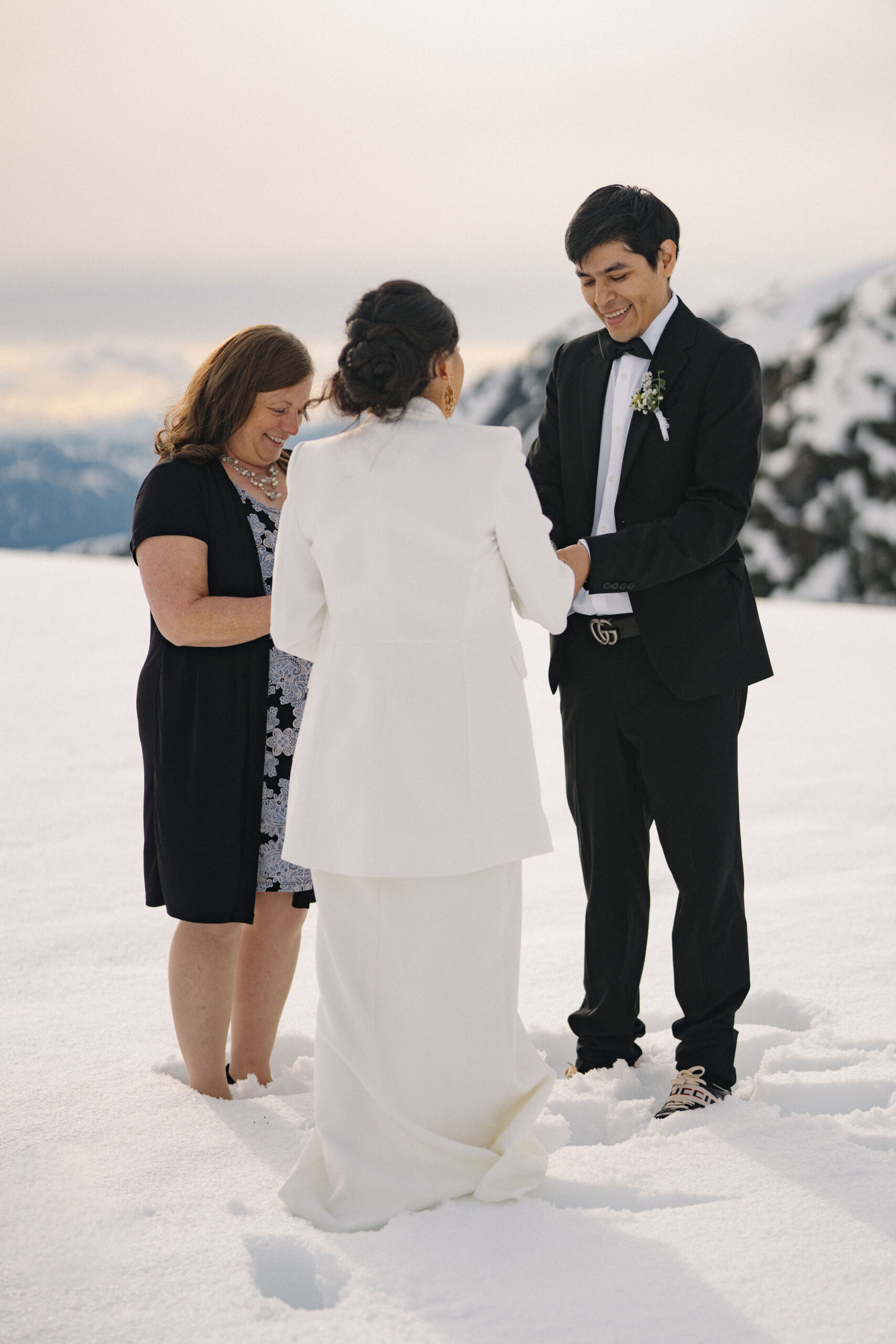 mountaintop elopement with sky helicopters and young hip and married in vancouver