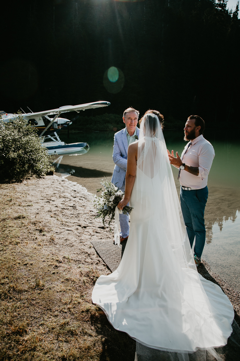 seaplane elopement wedding with young hip and married