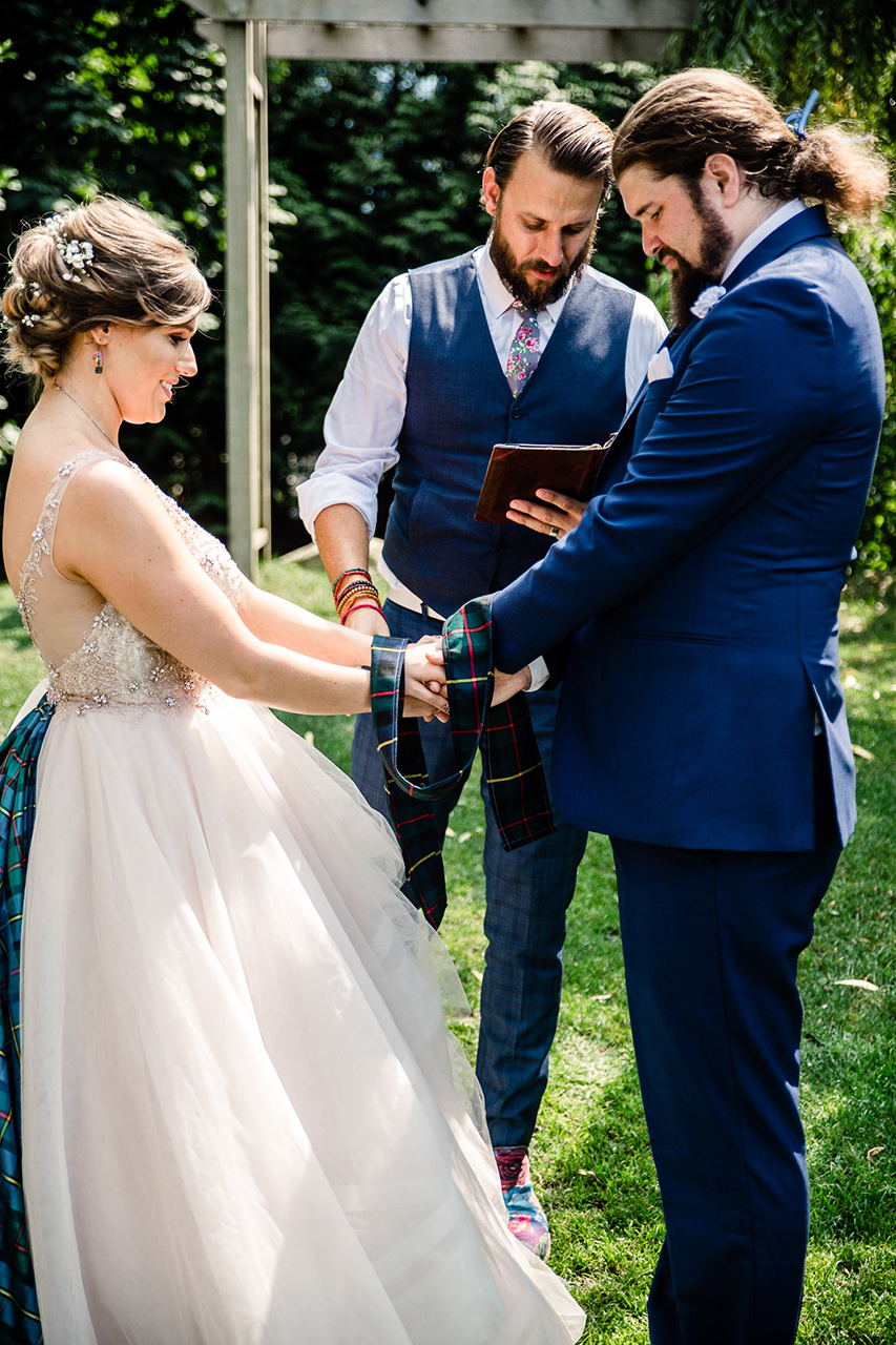 handfasting ceremony with young hip and married