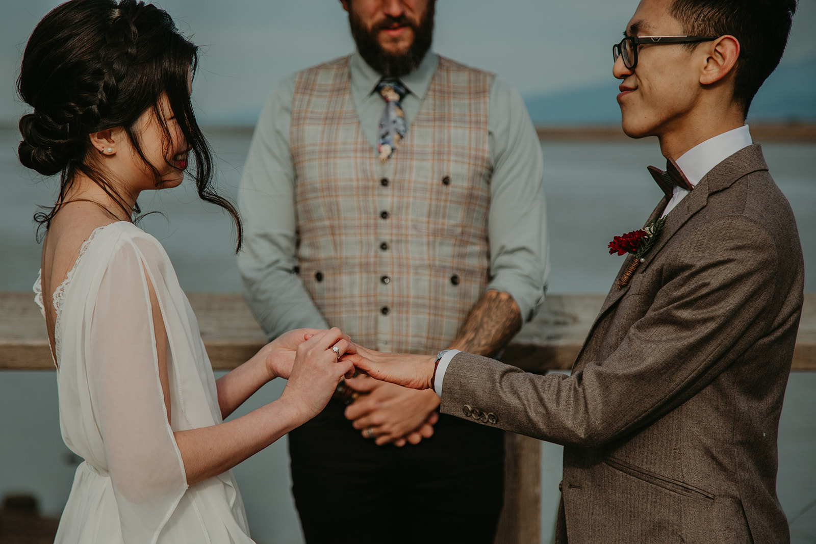 ring exchange during a young hip and married wedding elopement