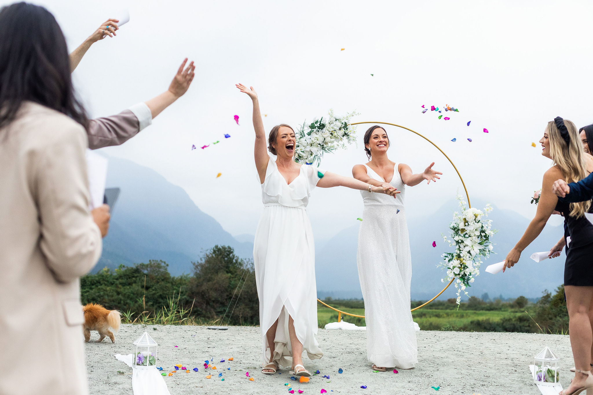 fun ideas for your wedding ceremony, brides walking out under confetti