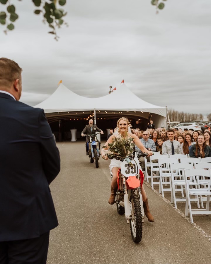 bride riding a motorcycle into her wedding ceremony, nontraditional wedding