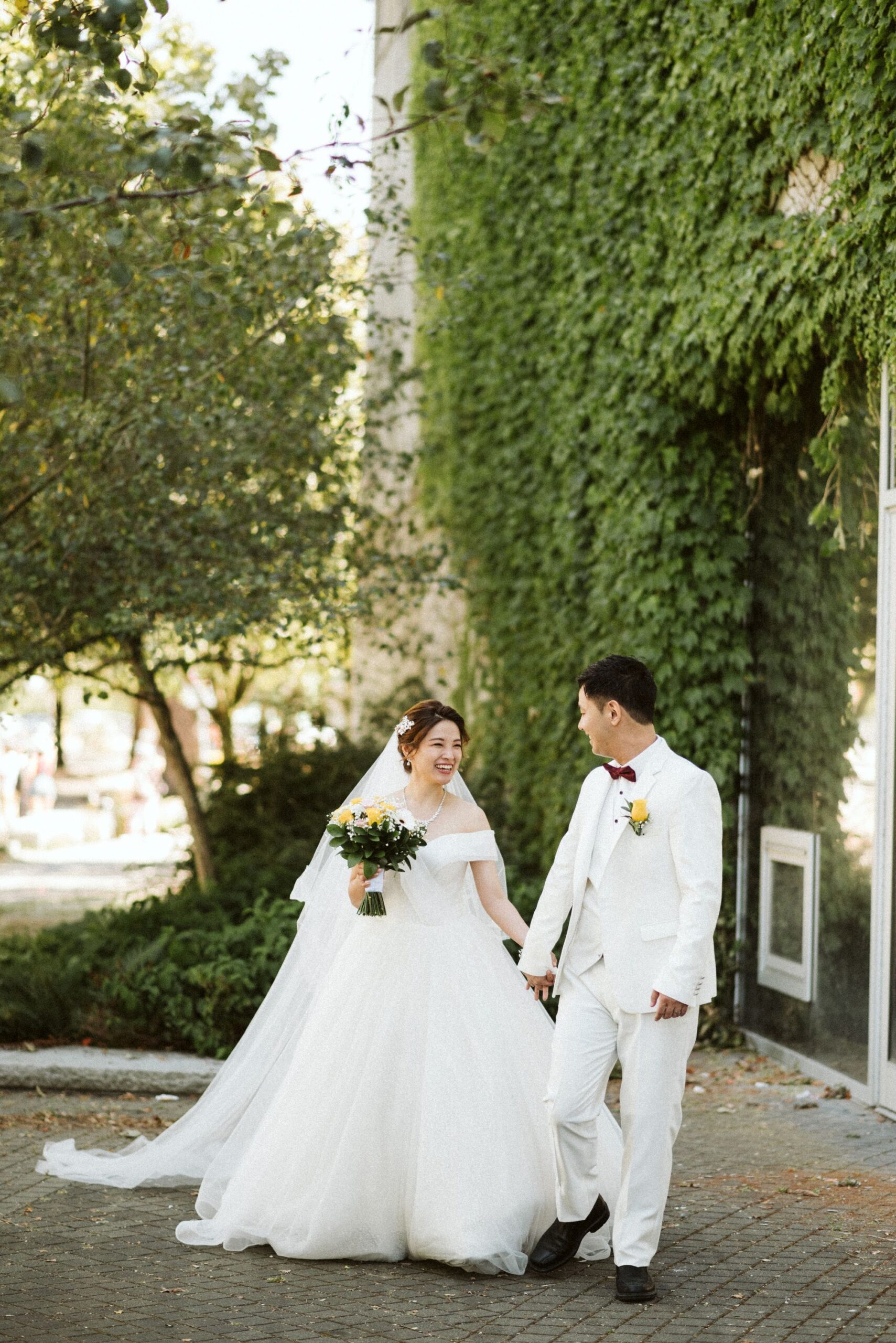vancouver wedding couple in all white outfits by jordyn keller