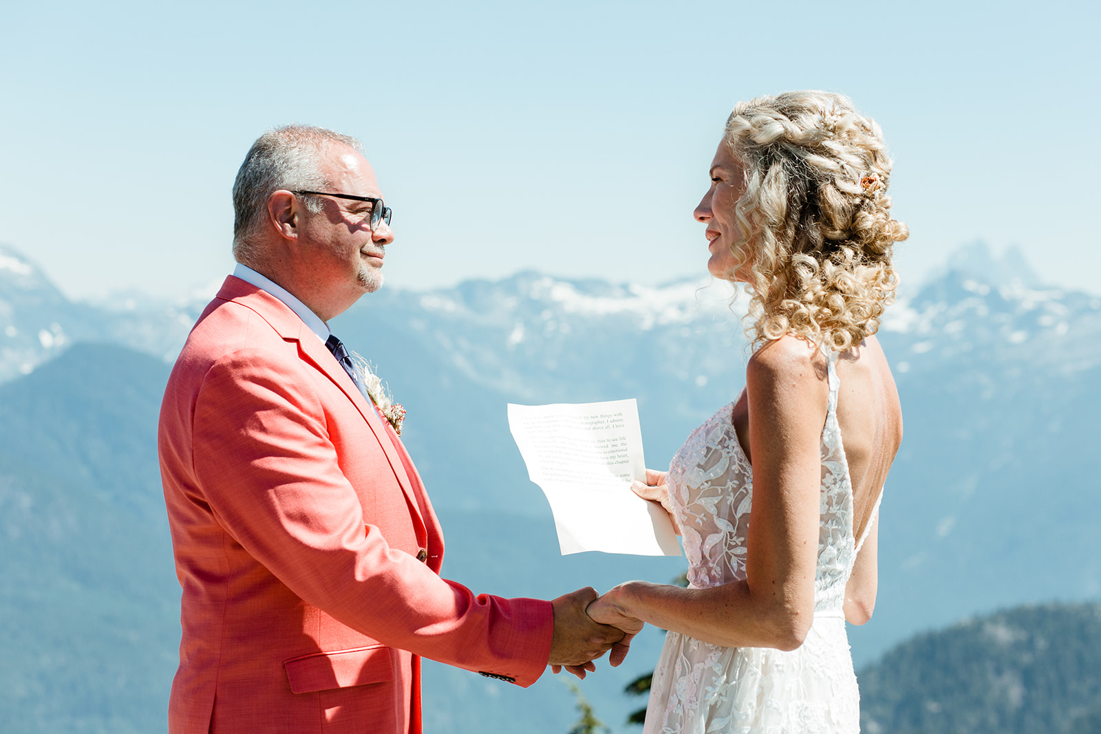 wedding vows during a helicopter elopement with young hip and married