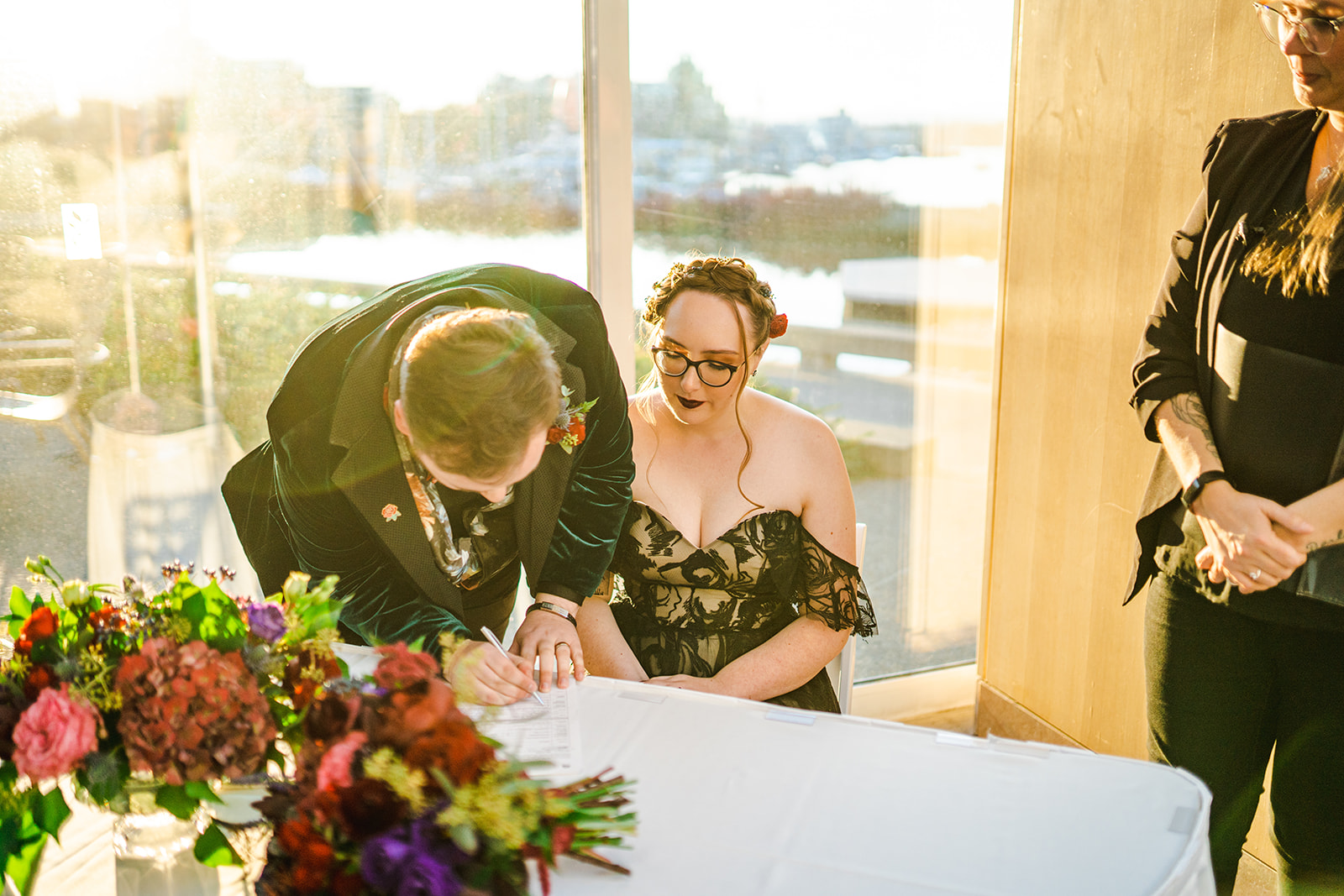sign your marriage licence, young hip and married wedding officiants