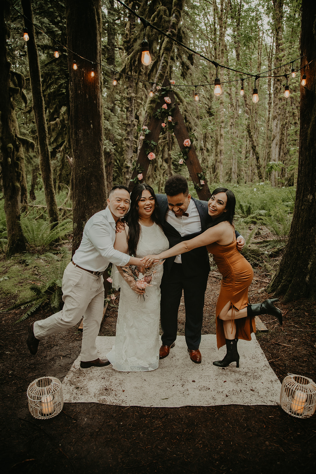 laughing and hugging after vancouver wedding ceremony with young hip & married