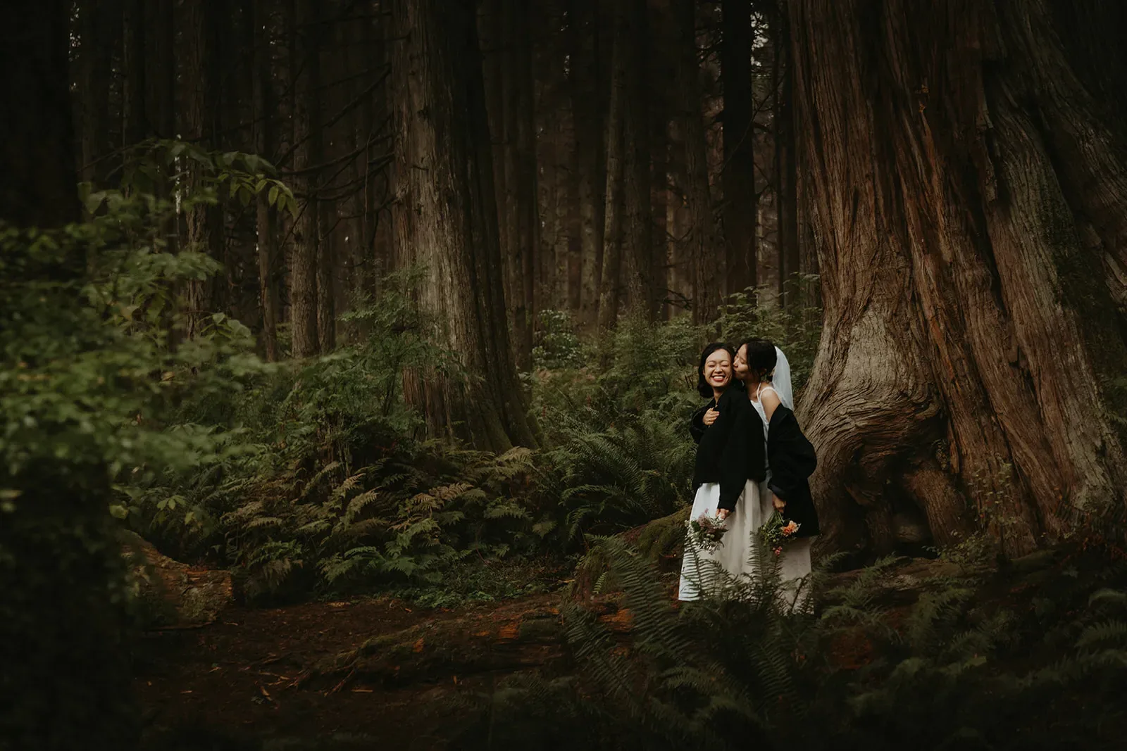Jane and Sophia embracing after their Young Hip & Married elopement, Erica Miller Photography